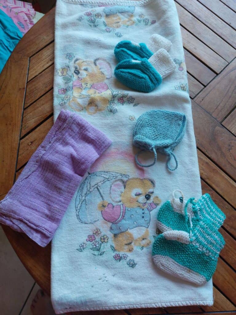 photo 2024 07 08 11 50 58 Nuscheli Decke Soeckli selbstgestrickt 768x1024